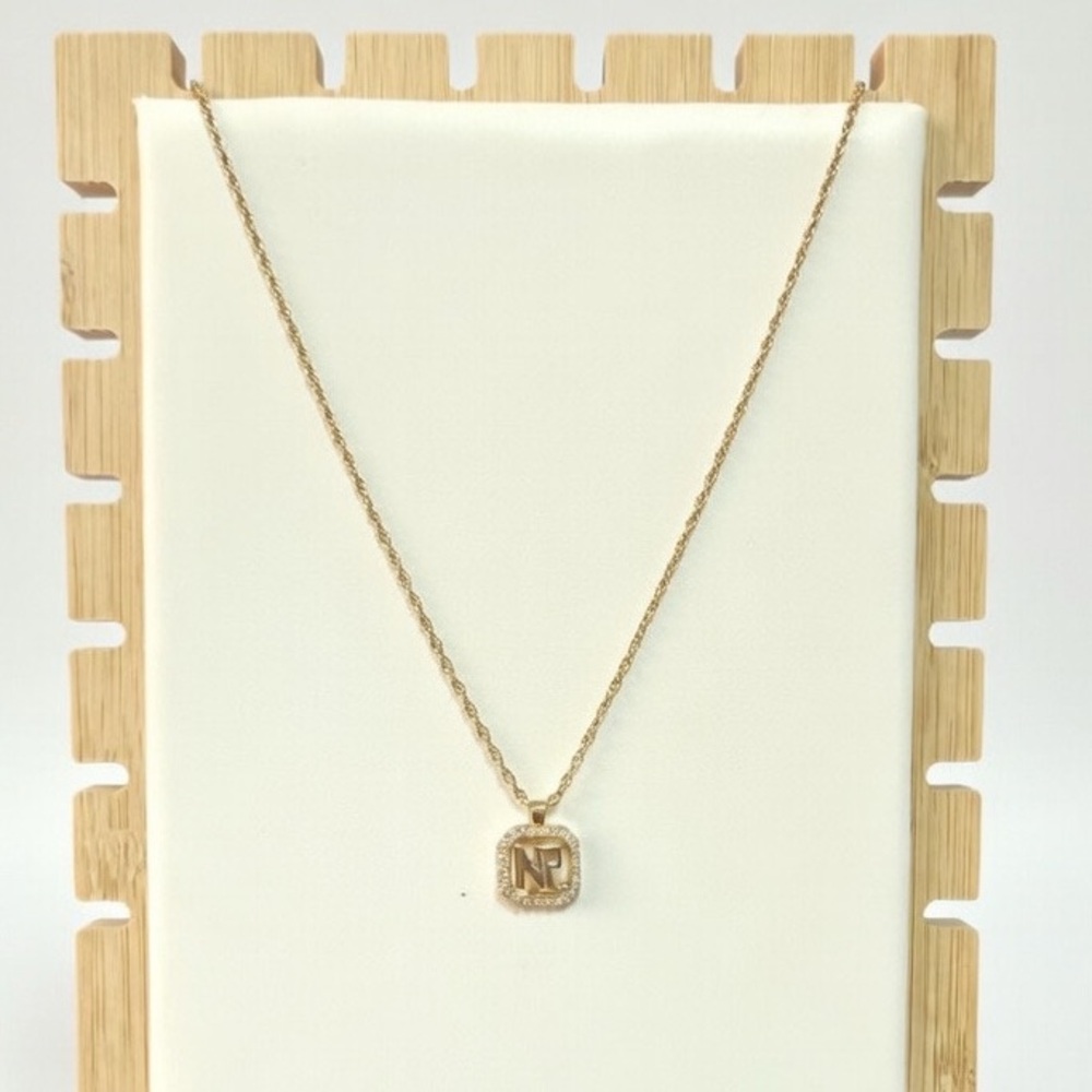 Nina Ricci goldtone pendant necklace